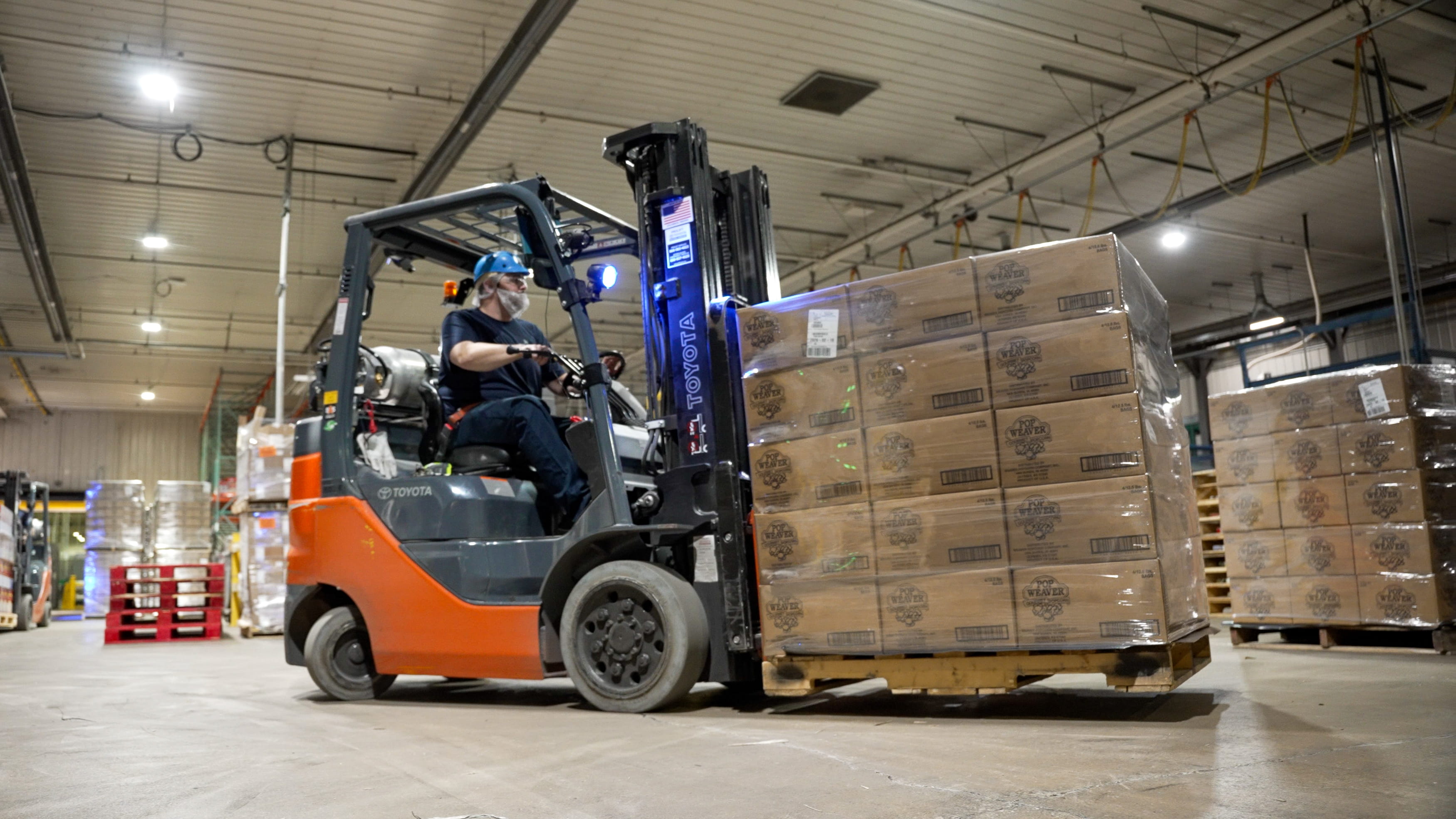 Employee Using Forklift